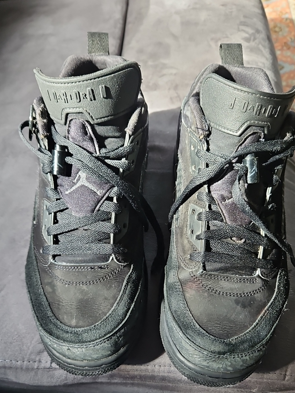 Jordan Men's Black High-Top Sneakers with Subtle Gray Accents